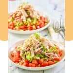 Two homemade CPK Italian chopped salad in bowls and two forks.