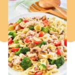 Chicken pasta salad on a white platter.