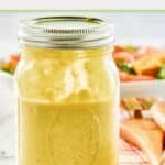 Homemade green onion vinaigrette salad dressing in a jar.