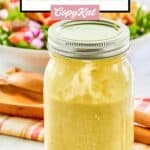 Green onion vinaigrette salad dressing in a jar.