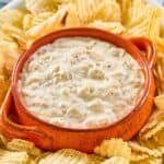 Ina Garten onion dip and thick-cut potato chips on a platter.