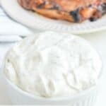 Homemade Outback Steakhouse tiger dill sauce in a white bowl.