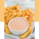 Homemade Raising Cane's sauce on a plate with French fries.