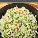 Homemade sweet and sour coleslaw in a black bowl.