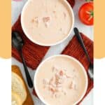 Overhead view of homemade 4B's creamy tomato soup in two bowls.