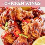 Closeup of homemade Buffalo Wild Wings Asian Zing chicken wings on a plate.