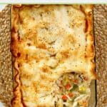 Homemade chicken pot pie in a casserole dish.