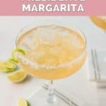 Homemade Chili's Presidente Margarita and lime wedges.