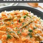 Copycat Commander's Palace seafood gumbo over rice in a bowl.