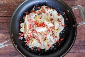 Cooking copycat Johnny Carino's bowtie festival in a skillet.