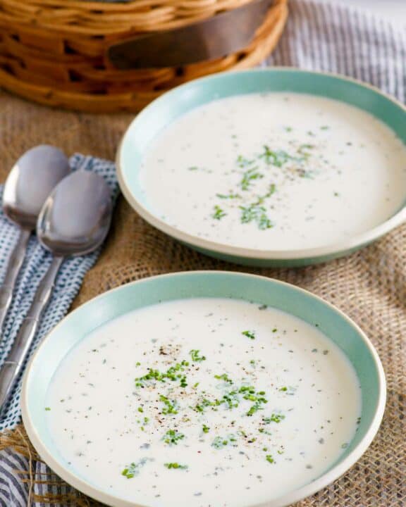 Homemade Grandma's old-fashioned potato soup in two bowls.