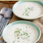 Homemade old-fashioned potato soup in two bowls.