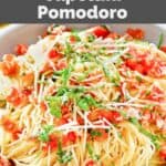 Copycat Olive Garden capellini pomodoro in a pasta bowl.