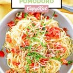 Overhead view of a bowl of homemade Olive Garden capellini pomodoro.