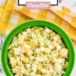 Overhead view of a bowl of pineapple coleslaw.