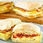 Homemade Starbucks bacon, egg, and gouda sandwich on a plate.