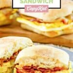 Homemade Starbucks bacon gouda sandwich cut in half on a plate.