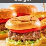 Homemade 21 Club burgers on a serving board.