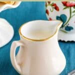 A small pitcher of homemade amaretto coffee creamer.
