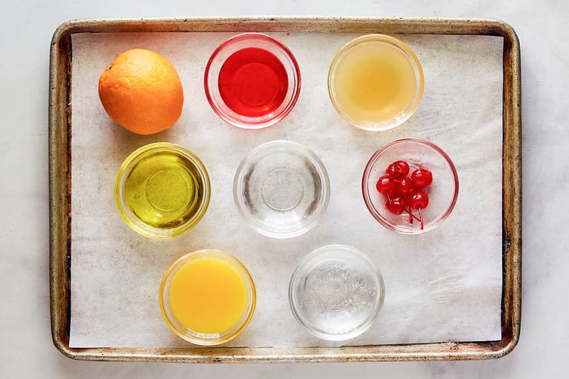 Copycat Applebee's Bahama Mama ingredients on a tray.