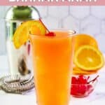Homemade Applebee's Bahama Mama drink, cherries, and oranges.