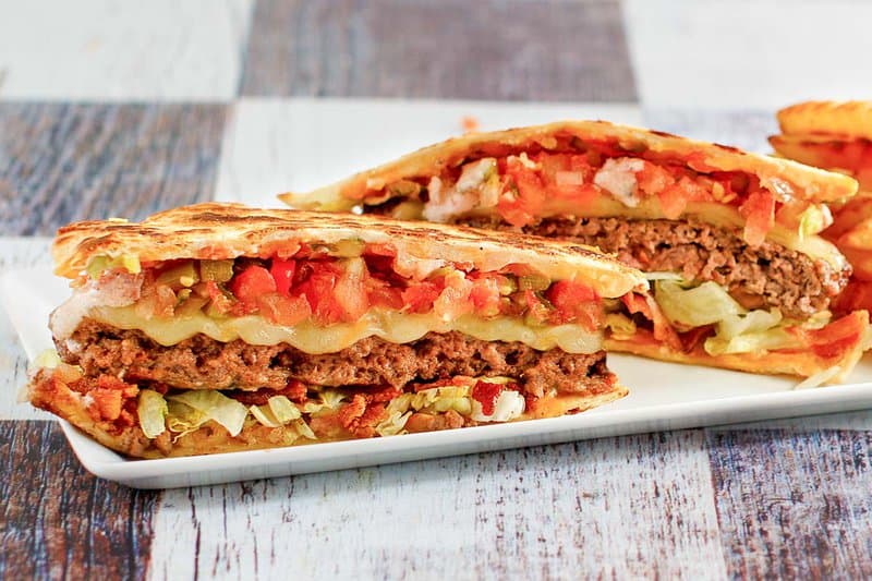 Copycat Applebee's quesadilla burger on a plate.