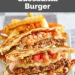 Homemade copycat Applebee's quesadilla burger and fries on a plate.