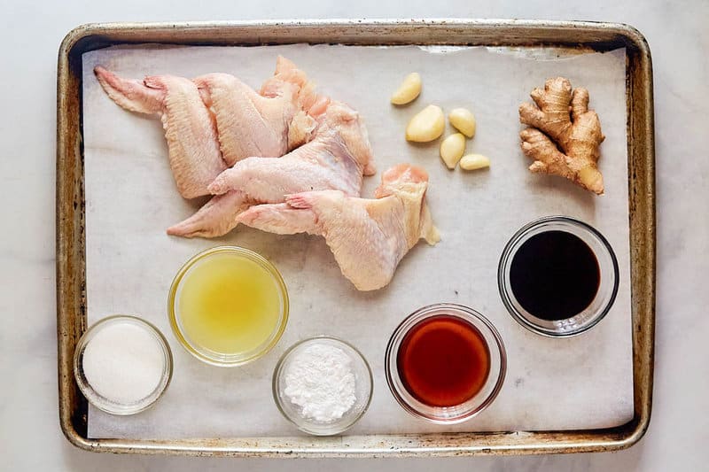 Copycat Buffalo Wild Wings General Tso chicken wings ingredients on a tray.