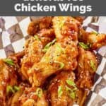 Homemade Buffalo Wild Wings General Tso wings in a parchment paper lined basket.