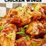 Homemade Buffalo Wild Wings General Tso wings on parchment paper.