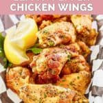 A serving basket with homemade Buffalo Wild Wings lemon pepper wings.