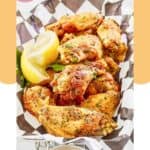 Homemade Buffalo Wild Wings lemon pepper wings in a serving basket.