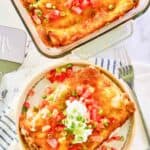 Overhead view of burrito casserole in a baking dish and on a plate.