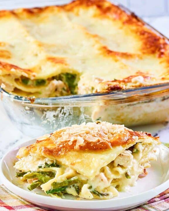 Chicken lasagna with asparagus and white wine sauce.
