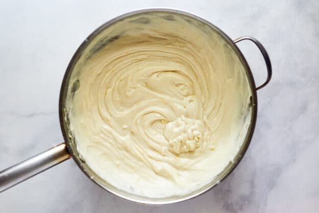White sauce in a pan before adding eggs and ricotta cheese.