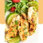 Three homemade Cracker Barrel grilled chicken tenders on a plate.