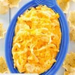 Overhead view of homemade Frank's buffalo chicken dip in a blue dish.