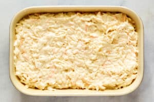 Hashbrown casserole mixture in a baking dish.