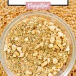 Overhead view of homemade Italian seasoned bread crumbs in a glass bowl.