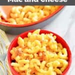 Copycat Luby's mac and cheese in a small red bowl.