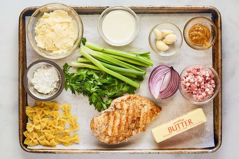 Copycat Macaroni Grill sugo bianco ingredients on a tray.