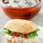 Copycat Newk's chicken salad sandwich on a white plate.