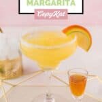 Homemade Olive Garden Italian margarita and a shot of amaretto on a serving tray.