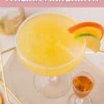 Homemade Olive Garden Italian margarita and a shot of amaretto next to it.
