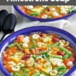 Copycat Olive Garden minestrone soup in a blue bowl.