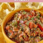 Homemade copycat Pappasito's salsa in an orange bowl.