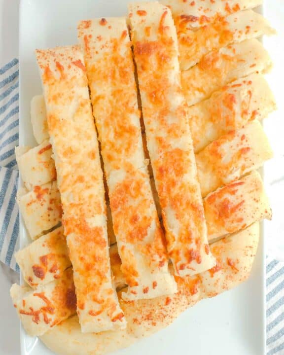 Copycat Pizza Hut cheese sticks on a platter.
