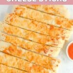 Overhead view of homemade Pizza Hut cheese sticks on a marble surface.