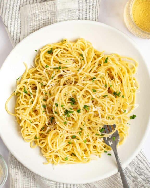 Overhead view of copycat Old Spaghetti Factory spaghetti with mizithra cheese and browned butter.