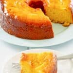 Bacardi rum cake slice on a plate and the cake behind it.
